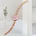 Elegante roségoldene Damen Quarzuhr mit Strass Blumen Gliedern und rosa Zifferblatt. - Roségold Lila