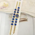 Damen Quarzuhr Set mit blauen Schmetterling Kristallgliedern und passendem Armband Schmuck. - Goldblau