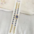 Goldfarbene rechteckige Quarzuhr fuer Damen mit blauem Tropfenstein Armband Schmuckset - Blau