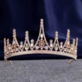 Detailed close-up of sparkling clear rhinestones on luxury gold crown metal tiara. - HG-006 Gold