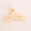 Elegant bow hair claw clip with sparkling rhinestones, minimalist resin shark clip for women. - Beige