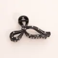 Black rhinestone hair claw clip minimalist elegant butterfly shark clip detail view - Black