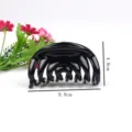 Large black plastic hair claw clip for women, classic styling for daily use and sports. - 9.8cm