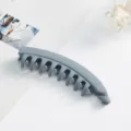 Grey banana hair clip for women, chic serrated vertical hair claw for elegant hairstyles. - Matte Blue