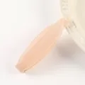 Detailed view of translucent jelly pink hair claw clip with cute dot texture for daily styling. - Pink
