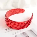 Red transparent plastic headband with geometric studs and embossed patterns for women. - 19cm Glossy Transparent Wine Red Textured Headband - LT Red 12