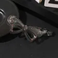 Transparent brown resin bow hair clip with pink rhinestones, perfect for elegant ponytails. - Pink Rhinestone Banana Clip (T1644) / 10.3cm / Transparent Gray