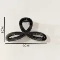 Glossy black plastic hair claw clip detail view, featuring simple geometric style and 9cm size. - Hair Claw (Z1559) / 9cm / Bright Black