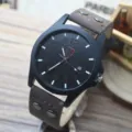 Men's frosted military quartz watch with brown leather rivet strap and calendar display. - Brown