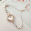 Montre quartz strass or rose pour femme avec bracelet coulissant réglable tendance. - Rose