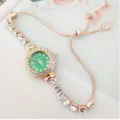 Élégante montre femme or rose cadran vert bracelet strass coulissant quartz brillant. - Vert