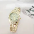 Gouden strass dames quartz horloge detail, sprankelende kristallen wijzerplaat romeinse cijfers. - Goud