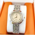 Elegant women's quartz wristwatch with rhinestone bezel, Roman numerals, and metal beaded strap. - Two-tone (Gold & Silver)