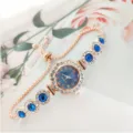 Exquisite women quartz watch with blue dial, rhinestone flower bezel, and pull-chain bracelet. - Rose Gold Blue