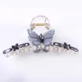 Transparente große Schmetterling Haarklammer mit schwarzen Strasssteinen für elegantes Styling. - Grau