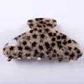 Elegante molletta per capelli in acetato con motivo a stelle per acconciature semplici e chic. - Pinza Stellata Aerodinamica / 8.5cm / Motivo a Stelle Bianco e Nero