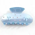 Molla per capelli in acrilico azzurro con strass scintillanti e graziosi fiocchetti. - Fiocco Blu