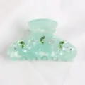 Morsetto per capelli in acrilico verde menta con eleganti strass e foglie cristallo. - Verde
