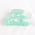 Pinza per capelli in acrilico verde menta con strass scintillanti, elegante accessorio donna. - Verde