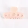 Molla per capelli in acetato traslucido rosa chiaro, variante dal design cavo. - Pinza Piccola Traforata (F461) / Rosa Chiaro Semitrasparente