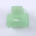 Molla per capelli verde chiaro traslucida e minimalista in acetato per acconciature chic. - Verde chiaro
