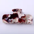 Molla per capelli in acetato con motivo marmo, elegante accessorio per styling quotidiano. - Texture Rosso Vino e Crema
