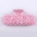 Molla per capelli maculata rosa e bianca, elegante accessorio in acetato per lo styling quotidiano. - Pinza per capelli / Macchiato Rosa e Bianco