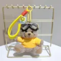 Cute pilot teddy bear plush keychain with goggles, yellow hoodie and lanyard bag charm. - Grey Bear in Yellow Clothes