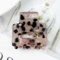 Piccola molletta per capelli geometrica in acetato con motivo astratto bianco e nero donna - Macchiato Bianco e Nero