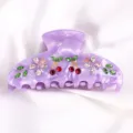 Molla per capelli in acetato viola con strass, design ciliegia e farfalla elegante. - Texture Viola