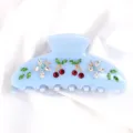 Molletta per capelli in acetato azzurro con strass ciliegie e farfalle per stile elegante. - Azzurro Cielo