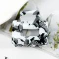 Morsetto per capelli quadrato con motivo bianco e nero, accessorio geometrico in acetato variante - Zebra Bianca e Nera