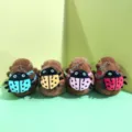 Cute capybara plush toy keychain featuring colorful ladybug backpack, soft animal pendant. - Mixed Batch