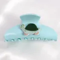 Molla per capelli azzurro chiaro con grazioso motivo a tartaruga, accessorio PVC elegante. - Pinza per Capelli Decorazione Tartaruga