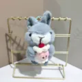 Grey plush rabbit keychain with cute mini cake pendant, soft stuffed doll bag charm detail. - 12cm Colored Rope / Gray