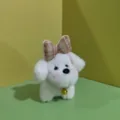 Dettaglio del portachiavi in peluche di cucciolo bianco carino con fiocco a quadretti e campanello d'oro. - Anello diviso piatto da 12 cm / Bianco