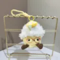 Cute plush toy keychain with glasses and lemon design, perfect bag charm pendant detail. - Yellow
