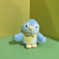 Cute plush penguin toy detail view, soft stuffed animal doll with a yellow mini scarf. - 12cm Flat Split Ring / Blue
