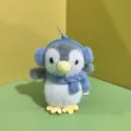 Cute penguin plush toy detail view, wearing blue earmuffs and scarf, soft stuffed pendant. - 12cm Elastic Cords / Gray