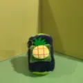 Detailed close-up of a cute cylindrical plush bread keychain featuring a pineapple plush charm. - 15CM Ball Chain / Black