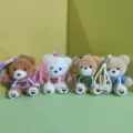 Detailed shot of cute plush bear keychains wearing colorful hoodies, hanging strap design. - 15cm Colorful Cord / Mixed Batch
