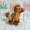 Cute brown plush horse toy detail, featuring a small saddle and soft furry mane for bags. - Saddle / Light Coffee