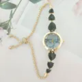 Elegant women quartz watch with gold chain strap and black heart rhinestones for daily wear - Gold Case Black