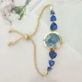 Fashion women quartz watch with blue heart crystal stones and adjustable gold chain strap. - Gold Case Blue