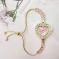 Gold rhinestone heart watch for women, pink dial and adjustable slider bracelet chain. - Pink