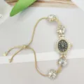 Reloj de cuarzo de pedrería para mujer con elegante pulsera de cadena ajustable y esfera oval. - Negro