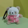 Cute plush panda keychain toy wearing a pink knit sweater, perfect bag hanging ornament. - Brown and Pink Sweater