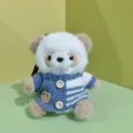 Cute panda plush keychain detail view showing the knitted sweater and buttons clearly. - Brown and Blue Sweater