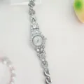 Elegant women rhinestone quartz watch with sparkling crystals and silver metal bracelet. - Silver
