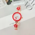 Detail view of stylish red flower women quartz watch with white dial and delicate rhinestone chain. - Red